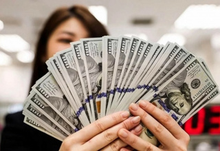 Tuần 14-18/09: Giá USD quốc tế vượt mốc 100 điểm, tỷ giá trung tâm tăng